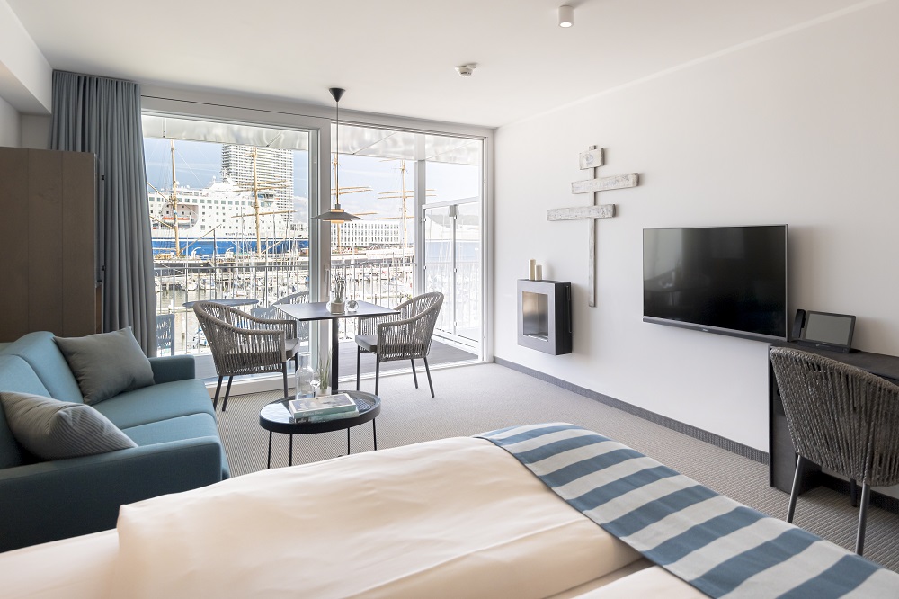 Slow down Travemünde stilvolle Hotelzimmer mit eigener Dampfsauna, Kamin, Balkon und Wasserblick